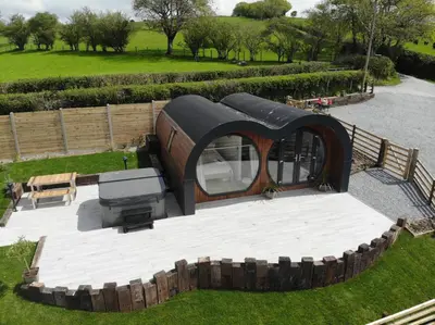 a small house is sitting on a patio at Creuddyn in Aberystwyth