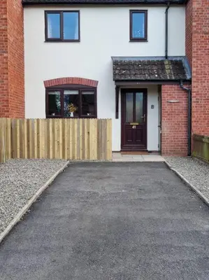 a driveway leading to a house with a door at 41 mortimer drive, ideal location near ludlow in Orleton