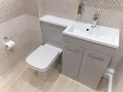 a bathroom with a white sink and a toilet at The William Morris Lodge in the centre of Ludlow - Pass the Keys in Ludlow