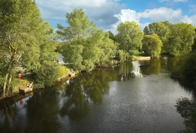 a view of a river from a bridge at Evenwood Byre in Kenley