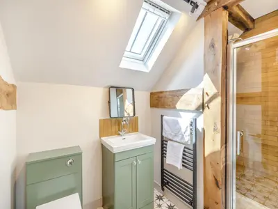a bathroom with a sink and a shower at The Stables - Uk44139 in Baystonhill
