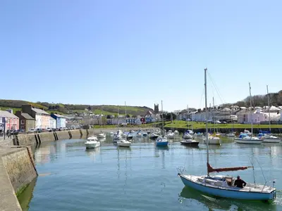 a group of boats docked in a harbor at Awelfa - On7 in Aberaeron