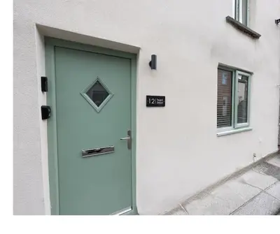 a door on the side of a building at Stylish, comfortable, convenient! in Bala