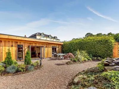 a house with a garden in front of it at Pansi - Uk40263 in Llangadfan