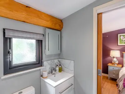 a bathroom with a sink and a window at Daffodil - Uk40266 in Llangadfan