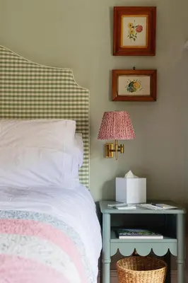 a bedroom with a bed and a table with a lamp at Ludlow Townhouse in Ludlow