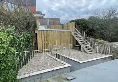 a set of stairs leading up to a building at Efail Fach in New Quay