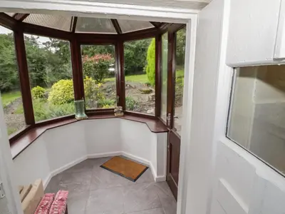 a view of a room with a window at Grove Cottage in Leominster