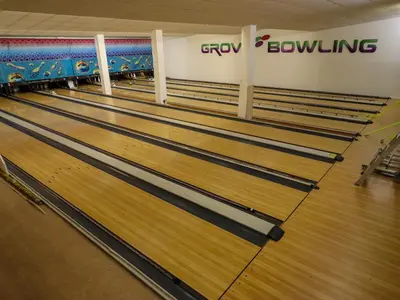 a row of bowling lanes in a bowling alley at Grove Cottage in Leominster
