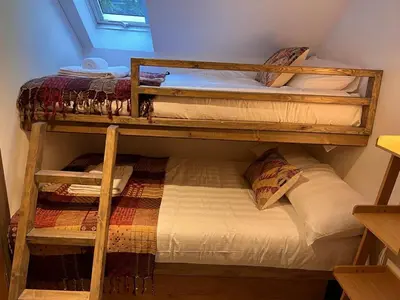 a couple of bunk beds in a room at Penestaer in Machynlleth