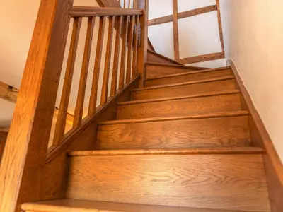 a staircase in a house with wooden floors and a window at Hidden Gem in Stunning Location - Pass the Keys in Cressage