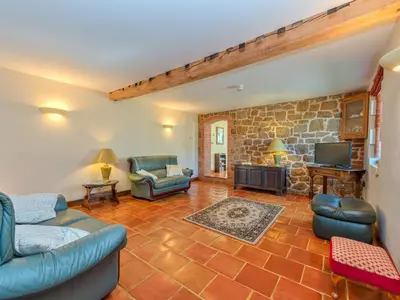 a living room with a couch and a tv at Hidden Gem in Stunning Location - Pass the Keys in Cressage