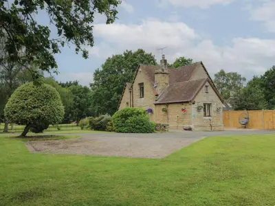 an old stone house in a park at Keepers Cottage in Leominster