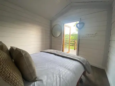 a small bedroom with a bed in a room at The Haystack in Oswestry