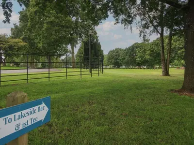 a sign in a park that reads to laughter buy or not like at Dove in Leominster