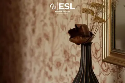 a vase with flowers in it next to a mirror at Large Country Farmhouse, Shropshire Hills View, with Hot Tub in Minsterley