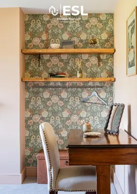 a dining room with a wooden table and chairs at Large Country Farmhouse, Shropshire Hills View, with Hot Tub in Minsterley