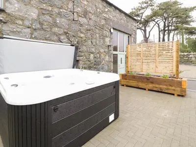 a outdoor area with a sink and a bench at The Barn by Lyons in Talybont