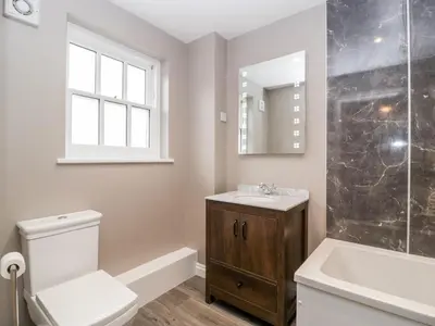 a bathroom with a toilet and a sink and a shower at 19 Lion Street in Hereford