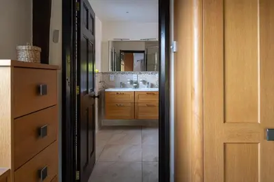 a bathroom with a sink and a mirror at Lake House in Brecon