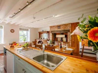 a kitchen with a sink and a counter top at 4 Bed in Corwen oc-88868 in Corwen