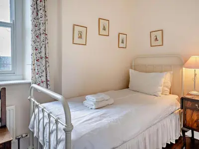 a bedroom with a bed with towels on it at 3 Bed in Brecon oc-bn134 in Brecon