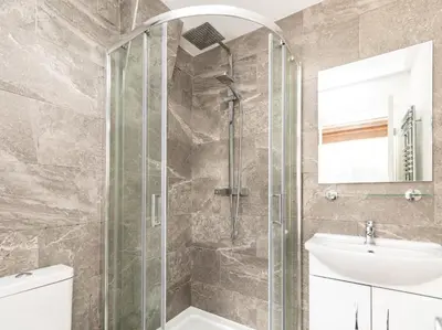 a bathroom with a shower and a sink at 4 Bed in Bala oc-75288 in Llandderfel