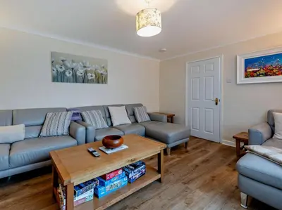 a living room with couches and a coffee table at 5 Bed in Llanybydder oc-75907 in Llanwenog