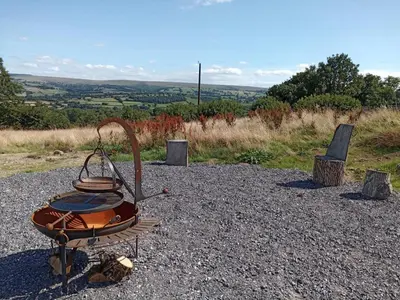 a metal object sitting on top of a pile of gravel at 5 Bed in Llanybydder oc-75907 in Llanwenog