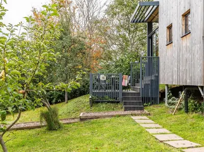 a garden with a gate and a house at 2 Bed in Brecon oc-59734 in Talgarth
