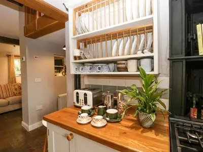 a kitchen with a counter top with a coffee maker at The Old Bakehouse in Leominster