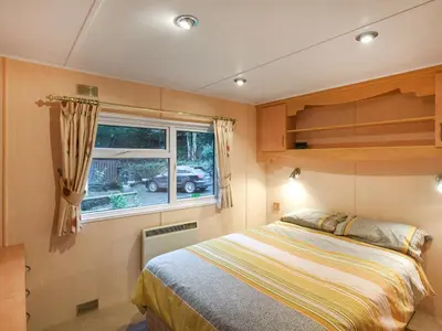 a bedroom with a bed and a window at The Beehive C29 - Uk45926 in Newtown