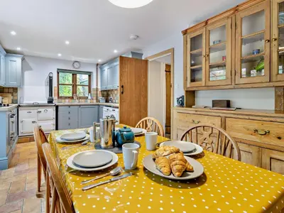 a kitchen with a table with a plate of food on it at 3 Bed in Clyro 88077 in Clyro