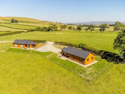 an overhead view of a house in a field at 2 Bed in Llandrindod Wells oc-89064 in Nantmel