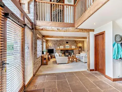 a large living room with a wooden ceiling at 3 Bed in Brecon oc-bn430 in Llangorse