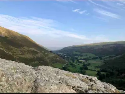 a view from the top of a mountain at Maytree Cottage. Compact home in Mid Wales. in Llanrhaeadr-ym-Mochnant