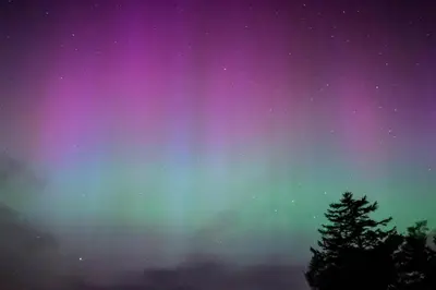 an image of the northern lights in the sky at Pandy Farmhouse - Panoramic mountain views within Snowdonia's National Park - 4x4 Only in Dolgellau