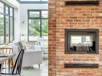 a living room with a brick wall with a fireplace at 5 Bed in Llanymynech oc-80686 in Llanymynech