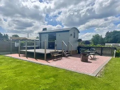 a tiny house on a patio in a yard at 1 Bed in Rhayader oc-90278 in Saint Harmon