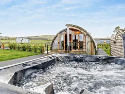 a large hot tub in the backyard of a house at 2 Bed in Rhayader oc-90276 in Saint Harmon