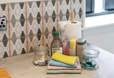 a counter top with towels and other items on it at Pigeon House - Unique Barn with private garden, hot tub and wood burner in Shrewsbury