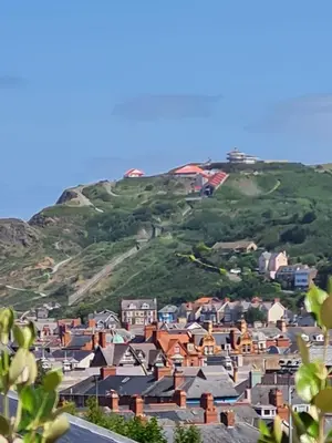 a small town on a hill with houses at Hilltop Hideaway 2 Bed Caravan with Panoramic Town Scenery in Aberystwyth Holiday Village F8 in Aberystwyth