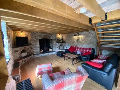 an overhead view of a living room with a fireplace at No 2 Dolheulog Aberaeron in Aberaeron