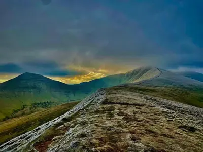 a view of a mountain from the top of a hill at Brecon serviced apartments- Kian Perrott Properties in Brecon