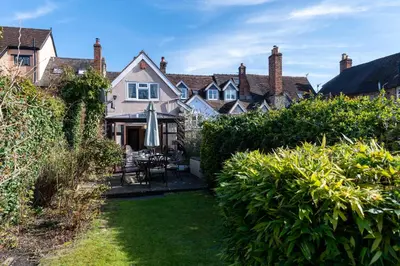 a view of a house with a yard at Toad Hall in Ludlow