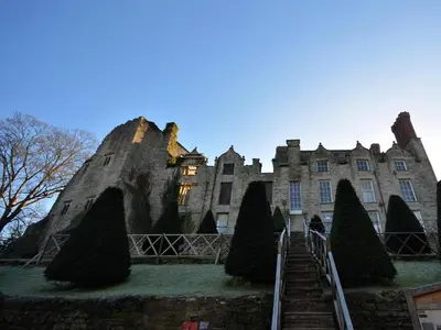 an old castle with a staircase leading up to it at 2 Bed in Brecon oc-51153 in Llandefalle