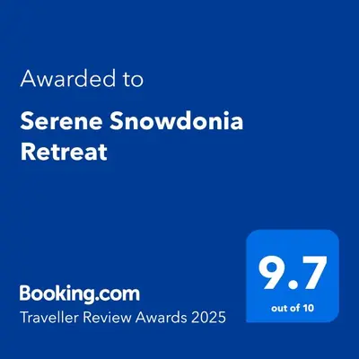 a screenshot of a phone with the text awarded to serre snowomania retreat at Serene Snowdonia Retreat in Trawsfynydd