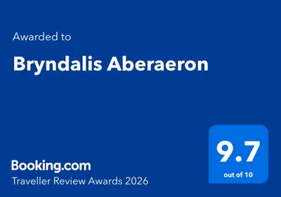 a blue sign with the text emailed to bangladeshadesh abalorealorealore at Bryndalis Aberaeron in Ciliau-Aeron