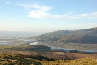 a view of a river from the top of a hill at Ty'r Adar at Graig Wen in Arthog