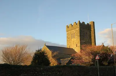 an old church with a tower on top of it at Ty Del - Beautiful Home in Tywyn in Tywyn